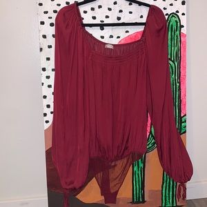 Free People satin body suit with lace lower half.